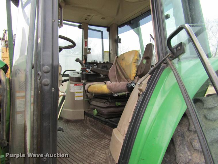 image for item DC4430 2002 John Deere 6420 tractor with side boom mower