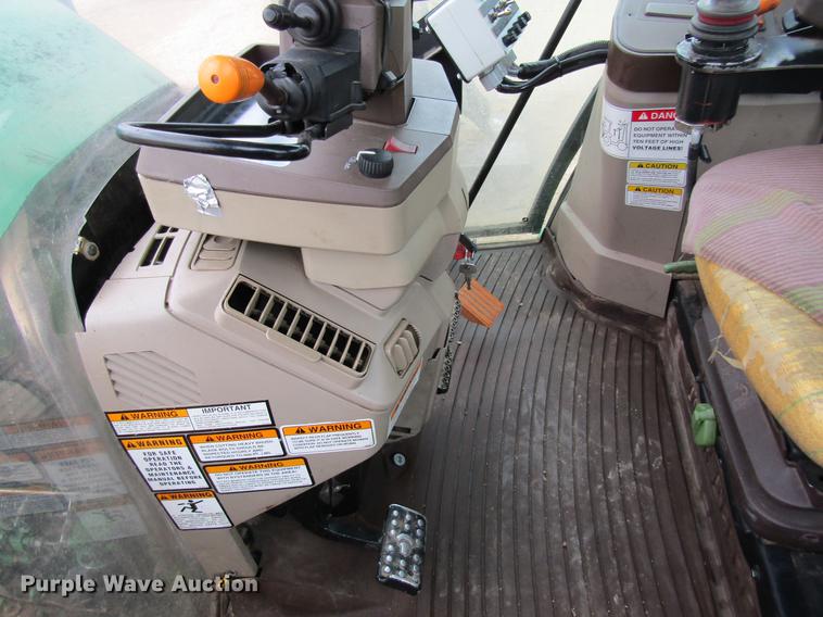 image for item DC4430 2002 John Deere 6420 tractor with side boom mower