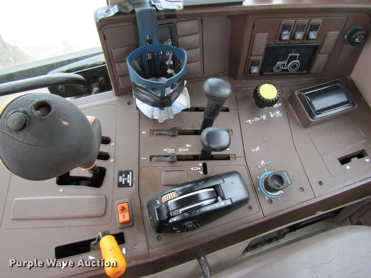 image for item DC4430 2002 John Deere 6420 tractor with side boom mower