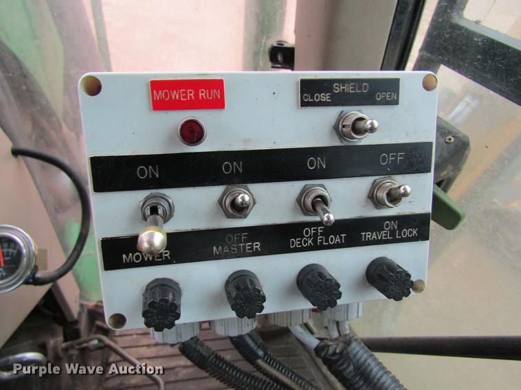 image for item DC4430 2002 John Deere 6420 tractor with side boom mower