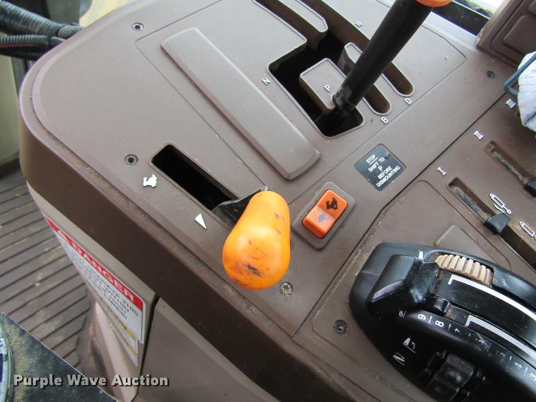 image for item DC4430 2002 John Deere 6420 tractor with side boom mower