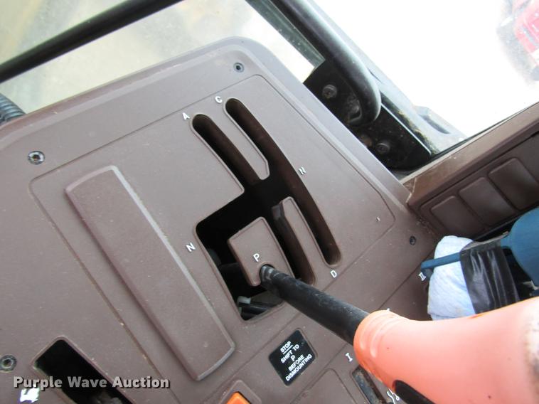 image for item DC4430 2002 John Deere 6420 tractor with side boom mower