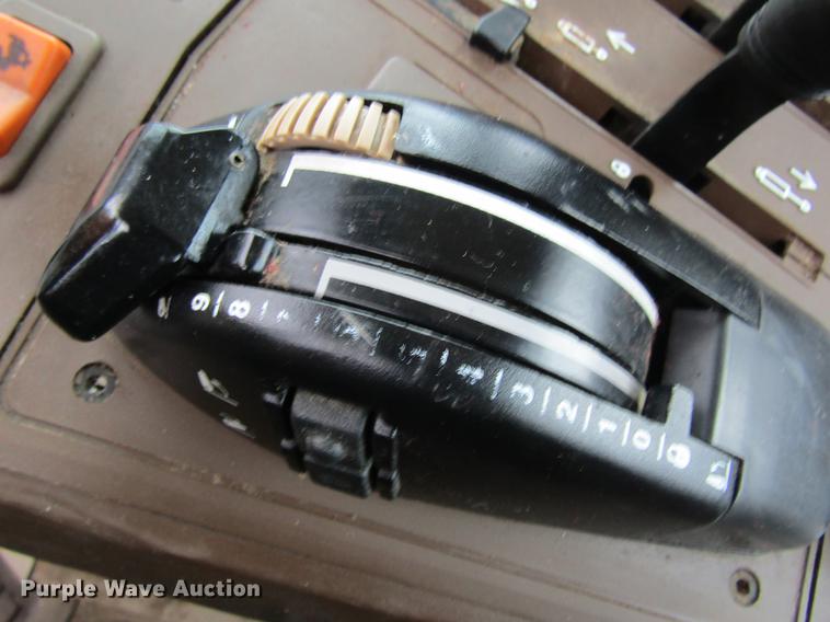 image for item DC4430 2002 John Deere 6420 tractor with side boom mower