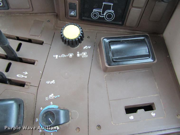 image for item DC4430 2002 John Deere 6420 tractor with side boom mower