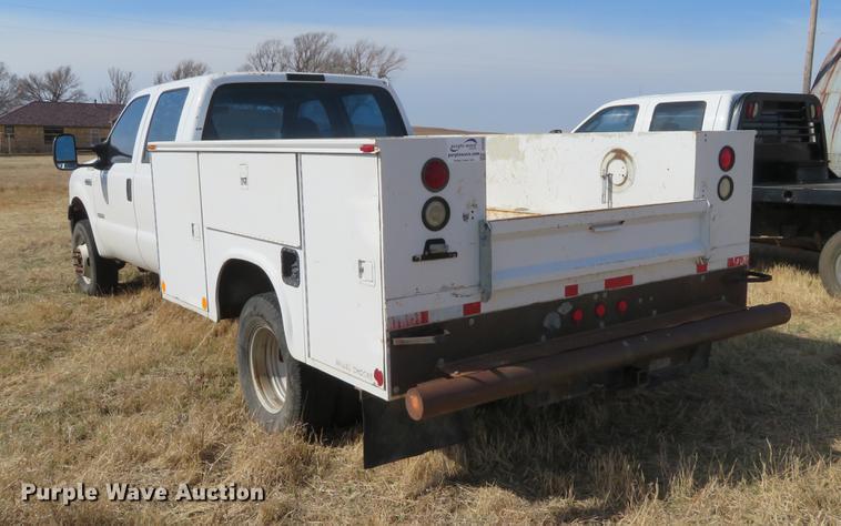 image for item DC0985 2006 Ford F350 Super Duty Crew Cab utility bed pickup truck