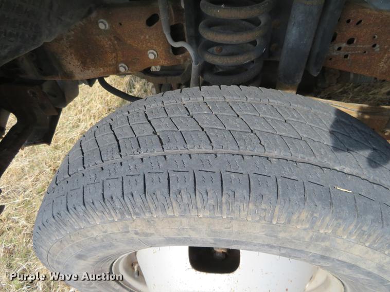 image for item DC0985 2006 Ford F350 Super Duty Crew Cab utility bed pickup truck