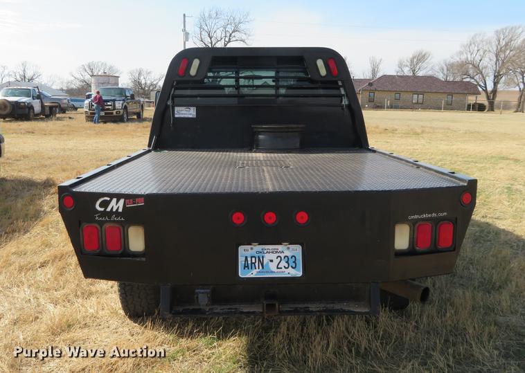 image for item DC0986 2009 Ford F350 Super Duty Crew Cab flatbed pickup truck