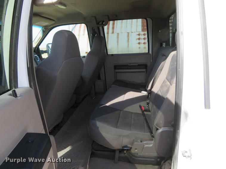 image for item DC0986 2009 Ford F350 Super Duty Crew Cab flatbed pickup truck