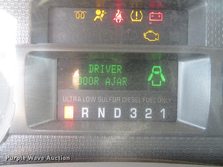 image for item DC0986 2009 Ford F350 Super Duty Crew Cab flatbed pickup truck