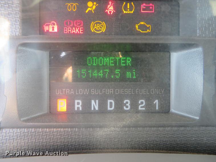 image for item DC0986 2009 Ford F350 Super Duty Crew Cab flatbed pickup truck