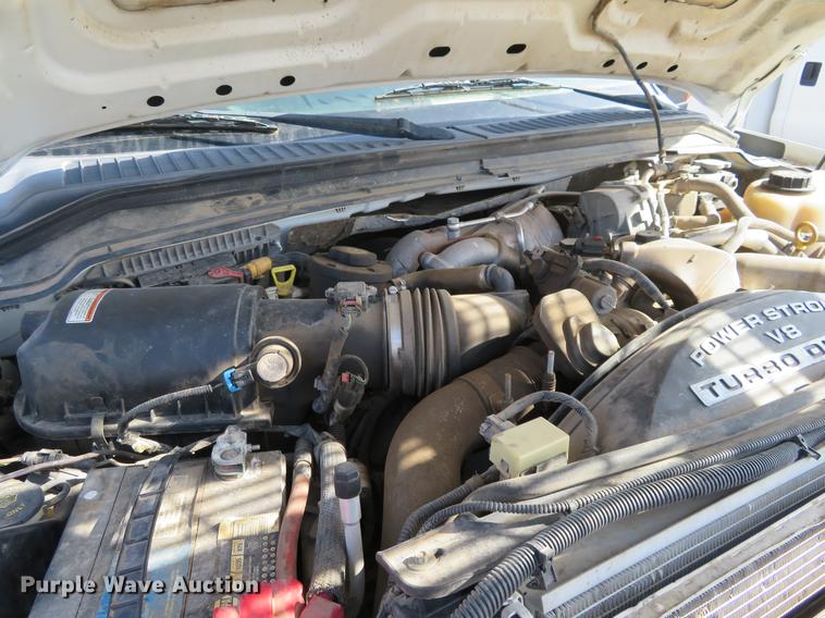 image for item DC0986 2009 Ford F350 Super Duty Crew Cab flatbed pickup truck