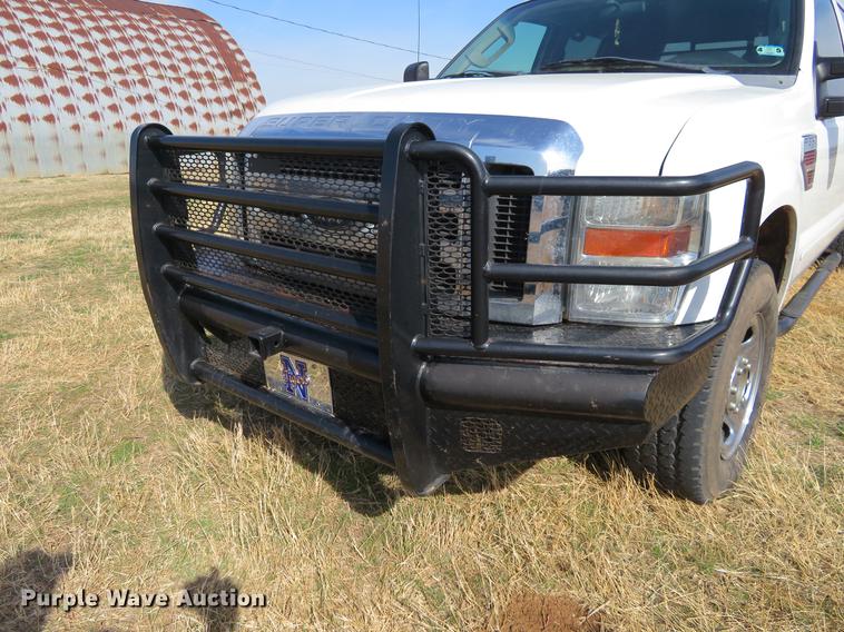 image for item DC0986 2009 Ford F350 Super Duty Crew Cab flatbed pickup truck