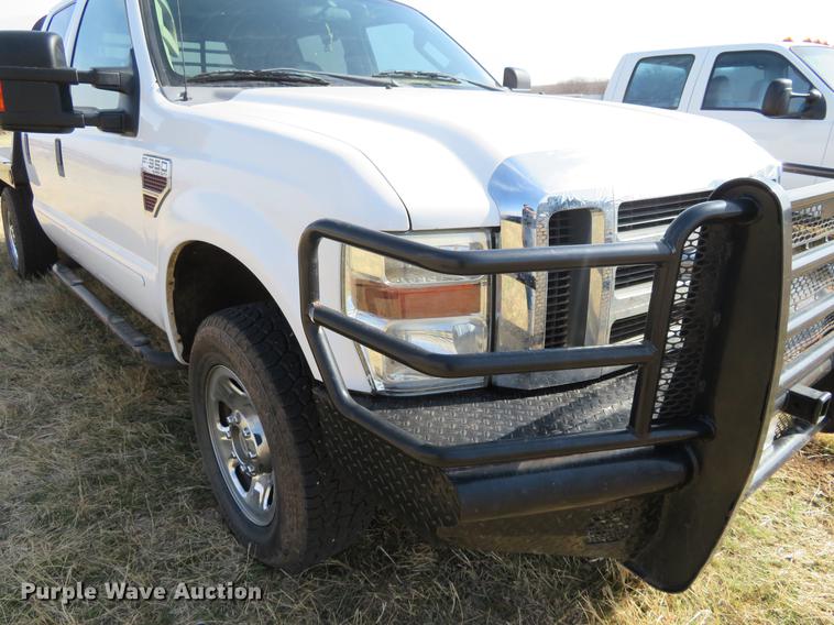 image for item DC0986 2009 Ford F350 Super Duty Crew Cab flatbed pickup truck