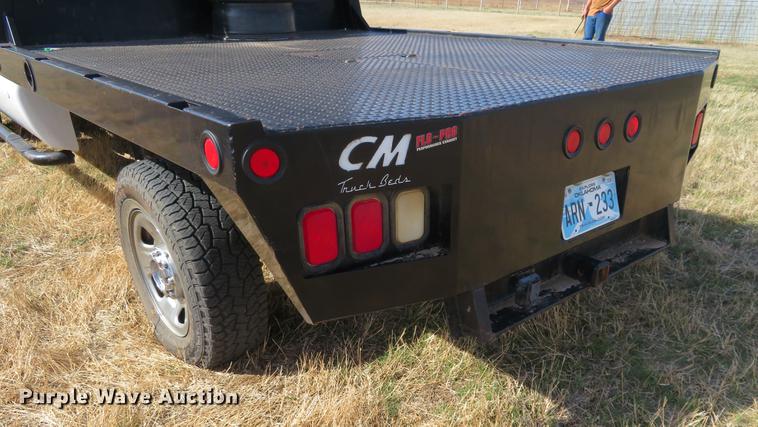 image for item DC0986 2009 Ford F350 Super Duty Crew Cab flatbed pickup truck