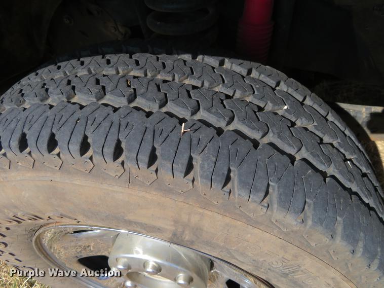 image for item DC0986 2009 Ford F350 Super Duty Crew Cab flatbed pickup truck