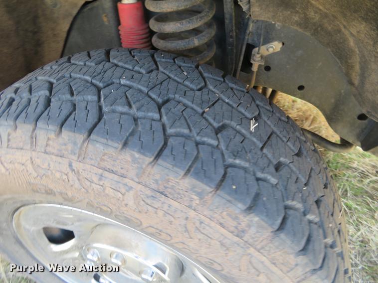 image for item DC0986 2009 Ford F350 Super Duty Crew Cab flatbed pickup truck