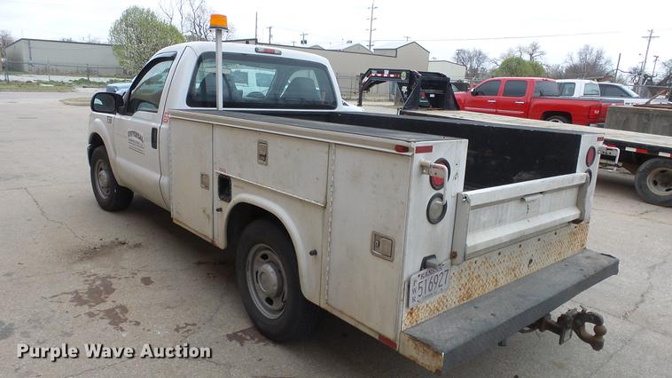 image for item DC3105 2011 Ford F250 Super Duty utility bed pickup truck