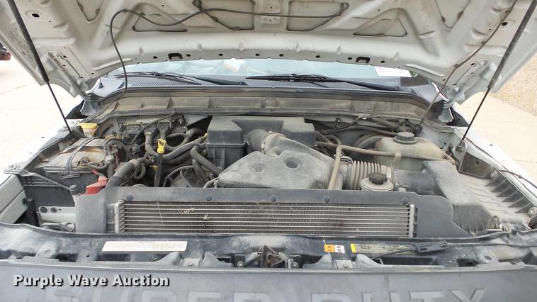 image for item DC3105 2011 Ford F250 Super Duty utility bed pickup truck