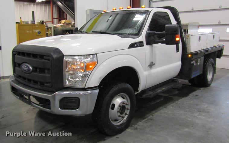image for item DC4351 2013 Ford F350 Super Duty flatbed pickup truck