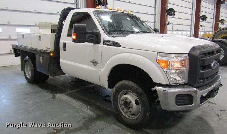 image for item DC4351 2013 Ford F350 Super Duty flatbed pickup truck