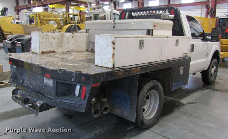 image for item DC4351 2013 Ford F350 Super Duty flatbed pickup truck