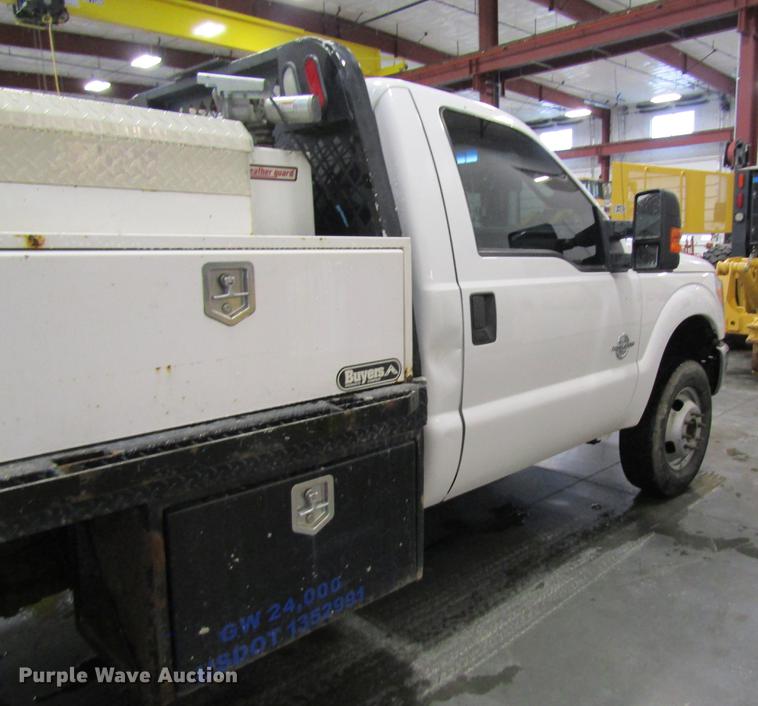 image for item DC4351 2013 Ford F350 Super Duty flatbed pickup truck