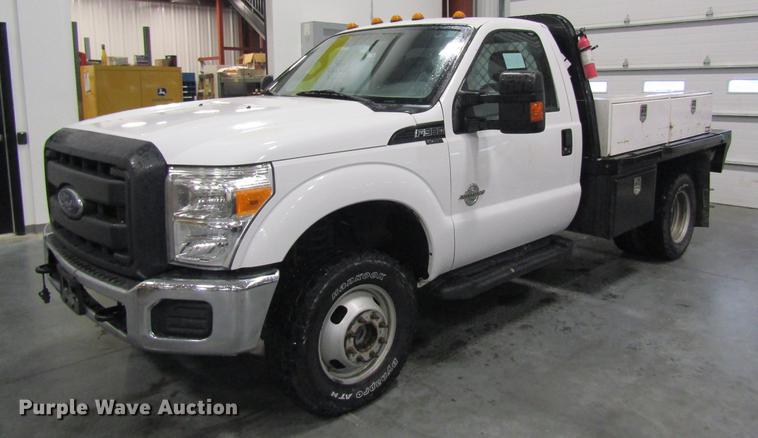 image for item DC4358 2013 Ford F350 Super Duty flatbed pickup truck