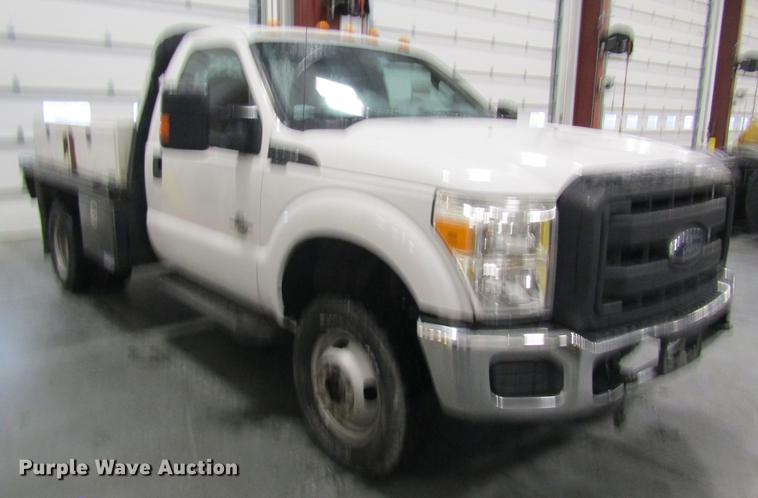 image for item DC4358 2013 Ford F350 Super Duty flatbed pickup truck