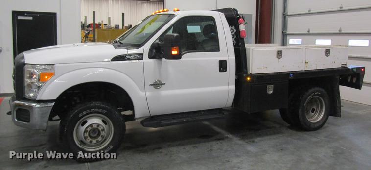 image for item DC4358 2013 Ford F350 Super Duty flatbed pickup truck