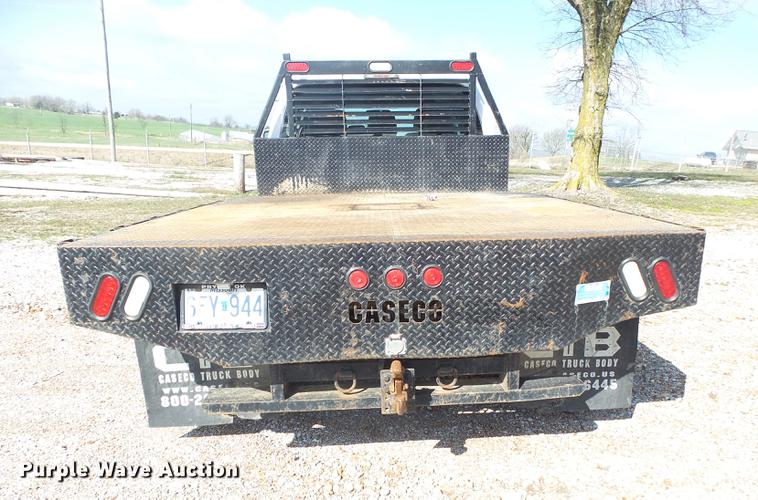 image for item DE3595 2012 Ford F350 Super Duty Crew Cab flatbed pickup truck