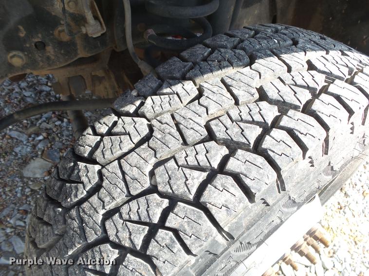 image for item DE3595 2012 Ford F350 Super Duty Crew Cab flatbed pickup truck