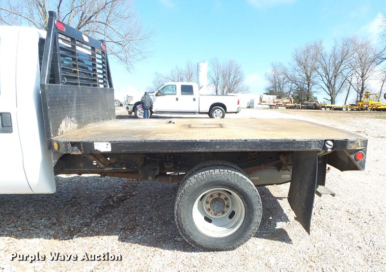 image for item DE3595 2012 Ford F350 Super Duty Crew Cab flatbed pickup truck