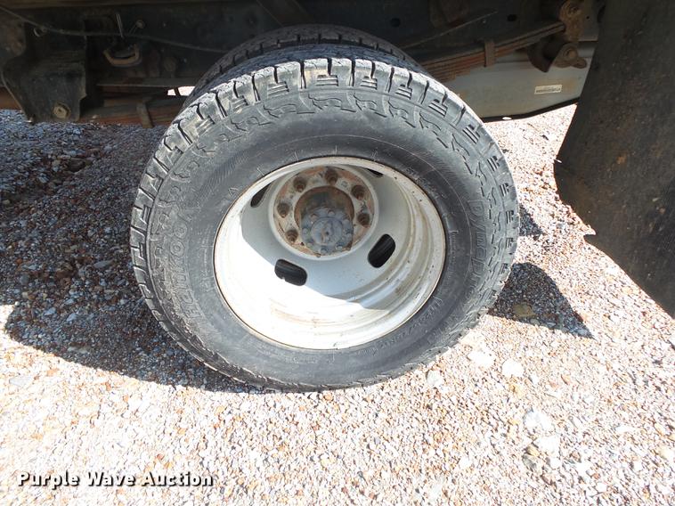 image for item DE3595 2012 Ford F350 Super Duty Crew Cab flatbed pickup truck