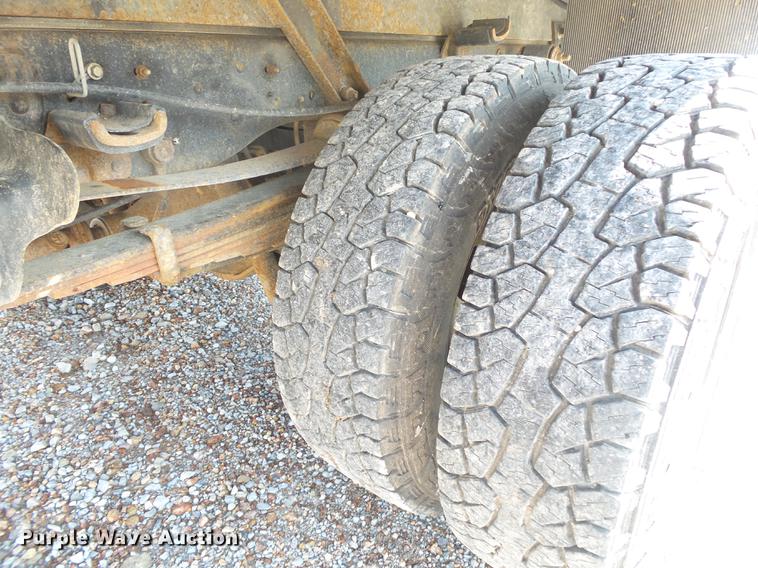 image for item DE3595 2012 Ford F350 Super Duty Crew Cab flatbed pickup truck