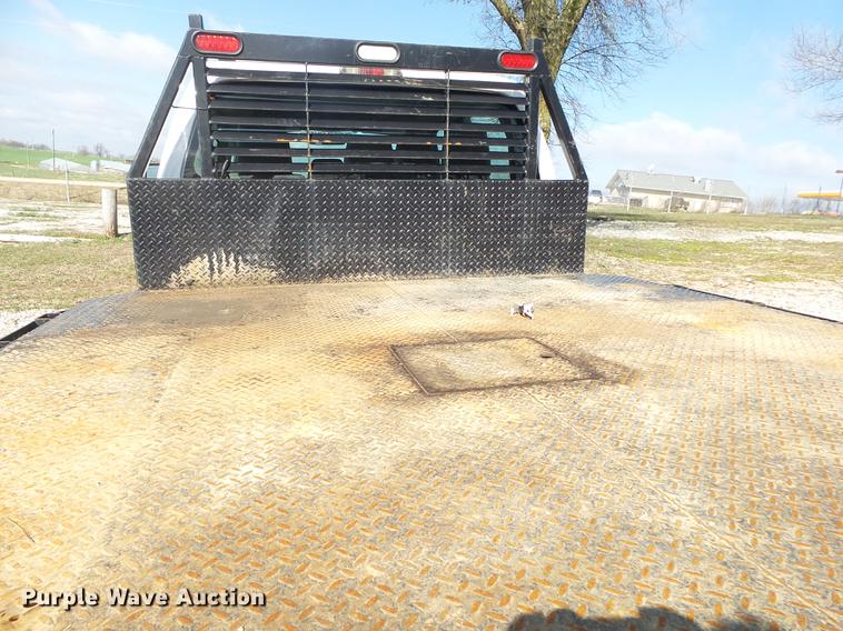 image for item DE3595 2012 Ford F350 Super Duty Crew Cab flatbed pickup truck