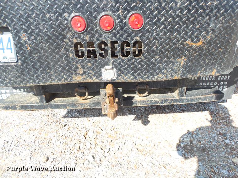 image for item DE3595 2012 Ford F350 Super Duty Crew Cab flatbed pickup truck