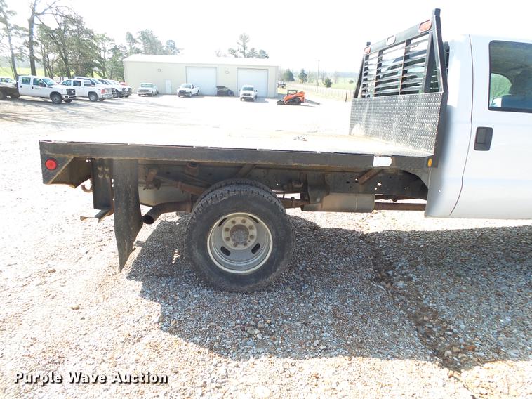image for item DE3595 2012 Ford F350 Super Duty Crew Cab flatbed pickup truck