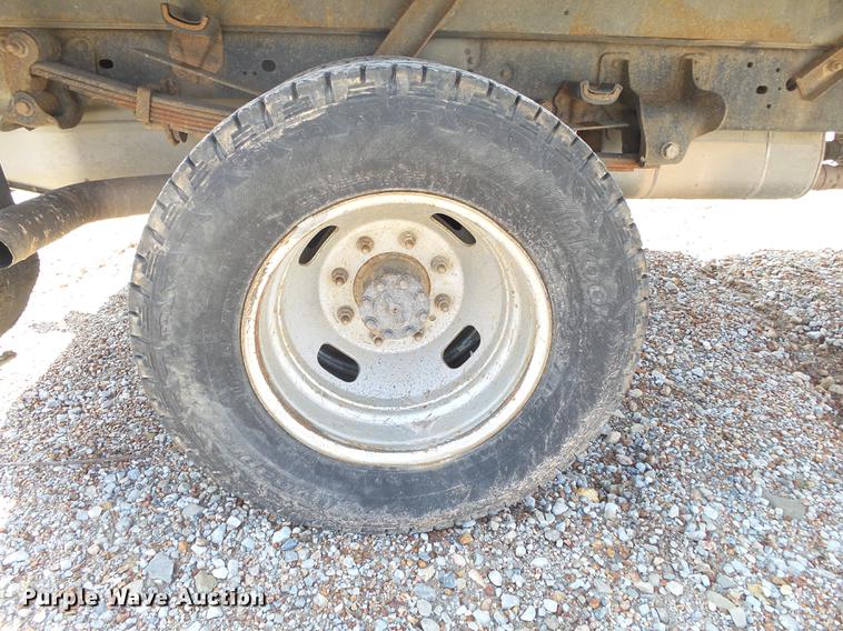 image for item DE3595 2012 Ford F350 Super Duty Crew Cab flatbed pickup truck