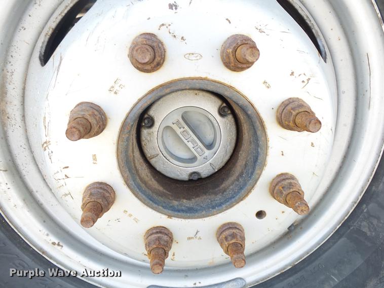 image for item DE3595 2012 Ford F350 Super Duty Crew Cab flatbed pickup truck