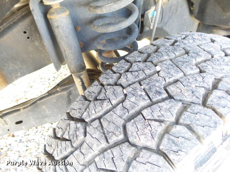 image for item DE3595 2012 Ford F350 Super Duty Crew Cab flatbed pickup truck