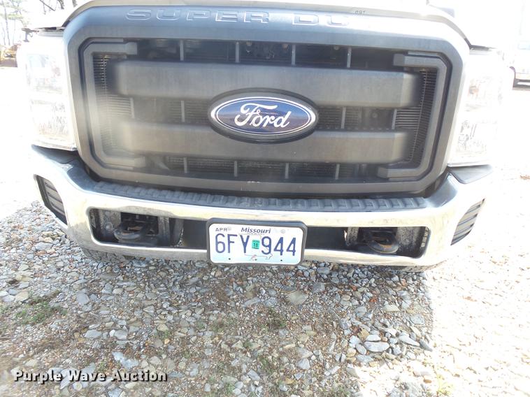 image for item DE3595 2012 Ford F350 Super Duty Crew Cab flatbed pickup truck