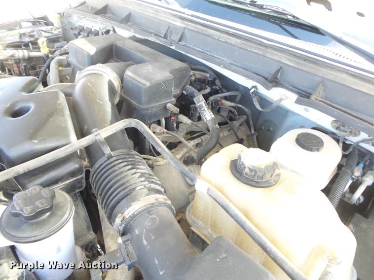 image for item DE3595 2012 Ford F350 Super Duty Crew Cab flatbed pickup truck