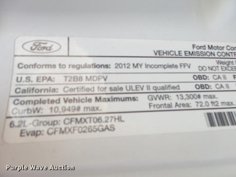 image for item DE3595 2012 Ford F350 Super Duty Crew Cab flatbed pickup truck