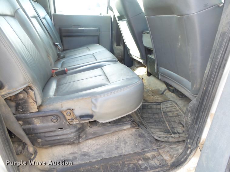 image for item DE3595 2012 Ford F350 Super Duty Crew Cab flatbed pickup truck