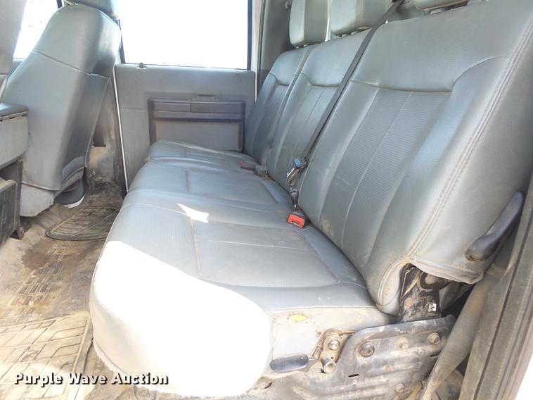 image for item DE3595 2012 Ford F350 Super Duty Crew Cab flatbed pickup truck