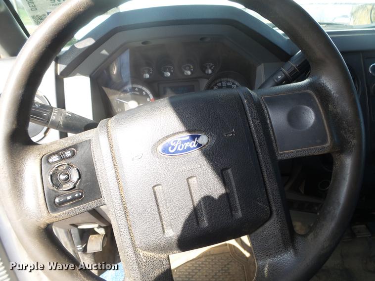 image for item DE3595 2012 Ford F350 Super Duty Crew Cab flatbed pickup truck