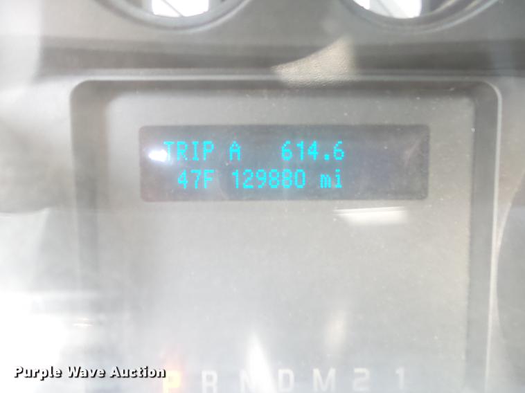 image for item DE3595 2012 Ford F350 Super Duty Crew Cab flatbed pickup truck