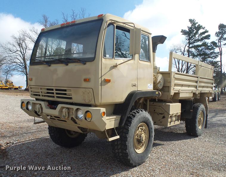 image for item DE3596 1997 Stewart Stevenson M-1078 flatbed truck