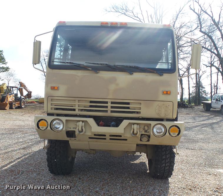 image for item DE3596 1997 Stewart Stevenson M-1078 flatbed truck