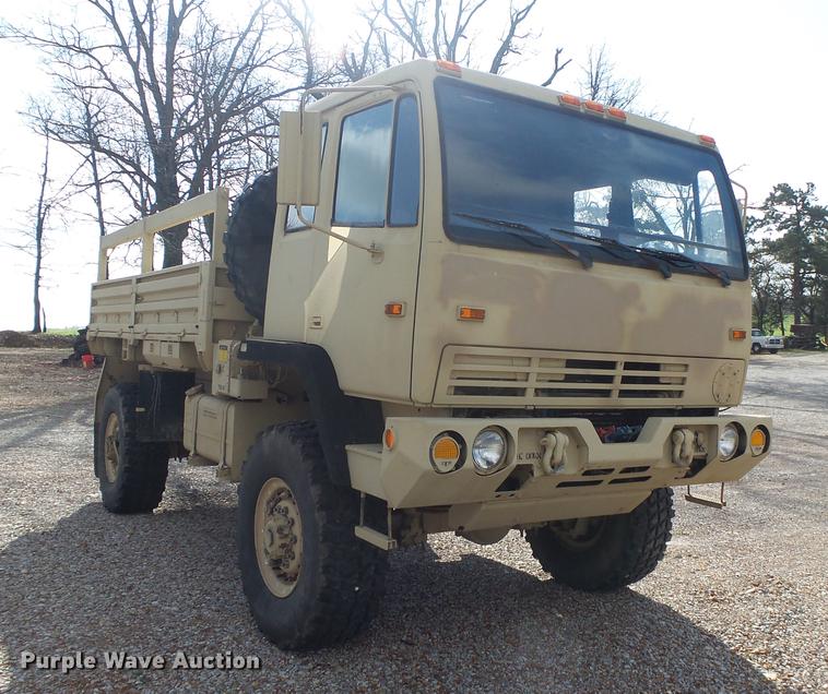 image for item DE3596 1997 Stewart Stevenson M-1078 flatbed truck